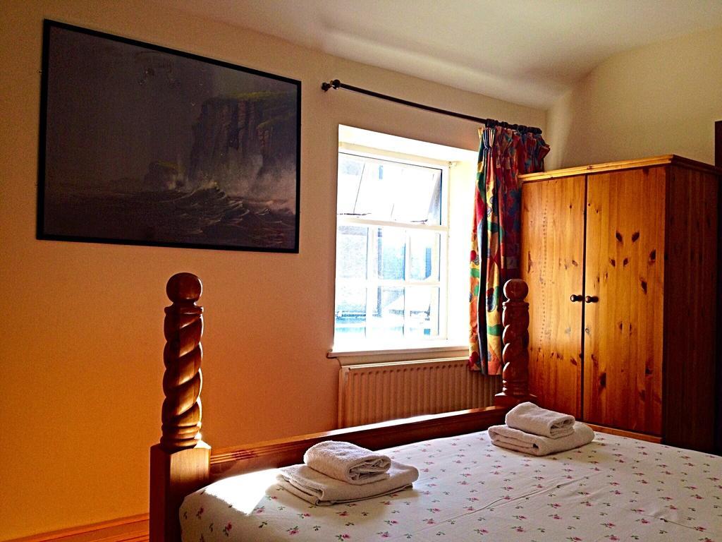 Cashel Town Center Inn Ruang foto